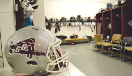 A football helmet in the Gee-Gees football teams locker room