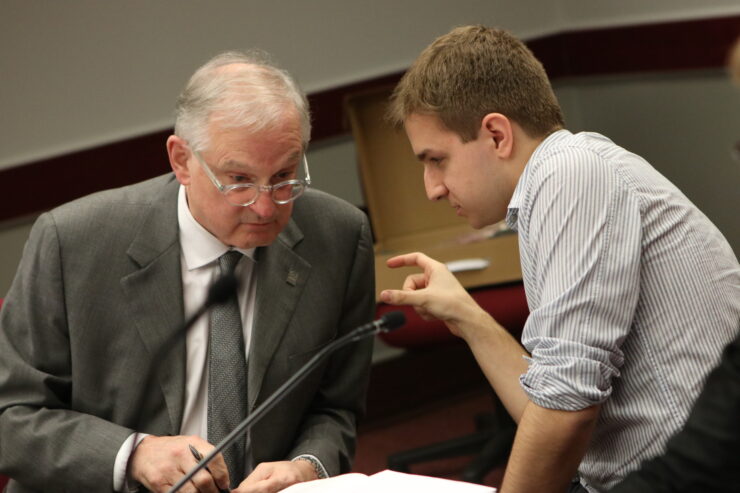 Jamie Ghossein (right), the BOG’s undergraduate student representative, consults with U of O president Jacques Frémont . Photo: Aaron Hemens/Fulcrum