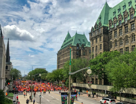 People in orange shirts flooded Wellington Street. Orange shirts symbolize the impact residential schools have on generations of Indigenous peoples in Canada.