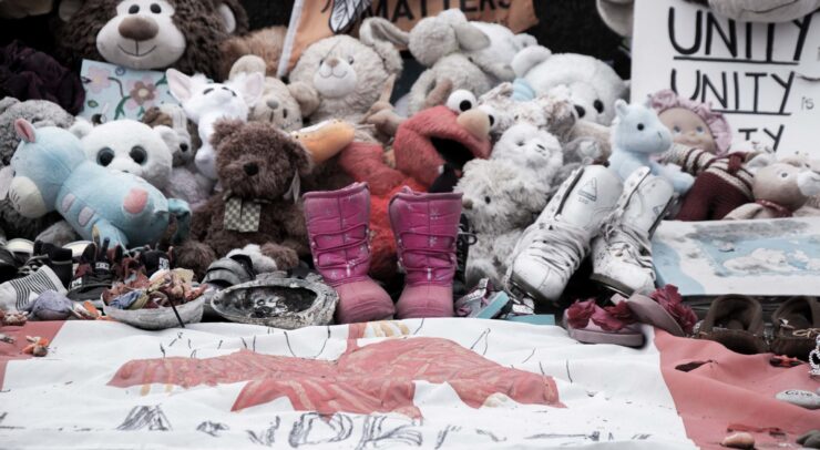 Stuffed animals are used as a stark remainder of the children who went to residential school