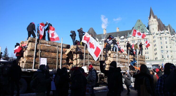 Protesters dancing on top of truck