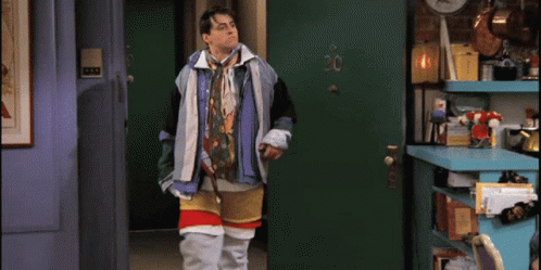 Joey from Friends wearing many clothes.