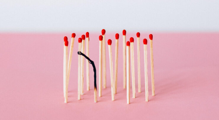 Photo of matches standing with one of them burnt