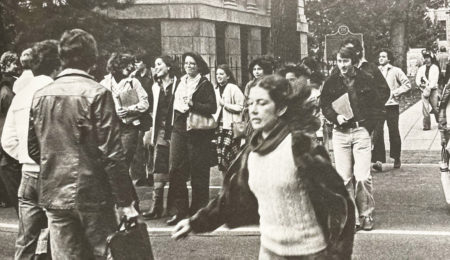 Crowd of students walking on campus during the late 70s
