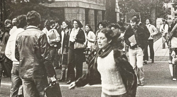 Crowd of students walking on campus during the late 70s
