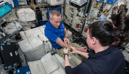 Dr. David Saint-Jacques having blood drawn aboard the International Space Station for MARROW