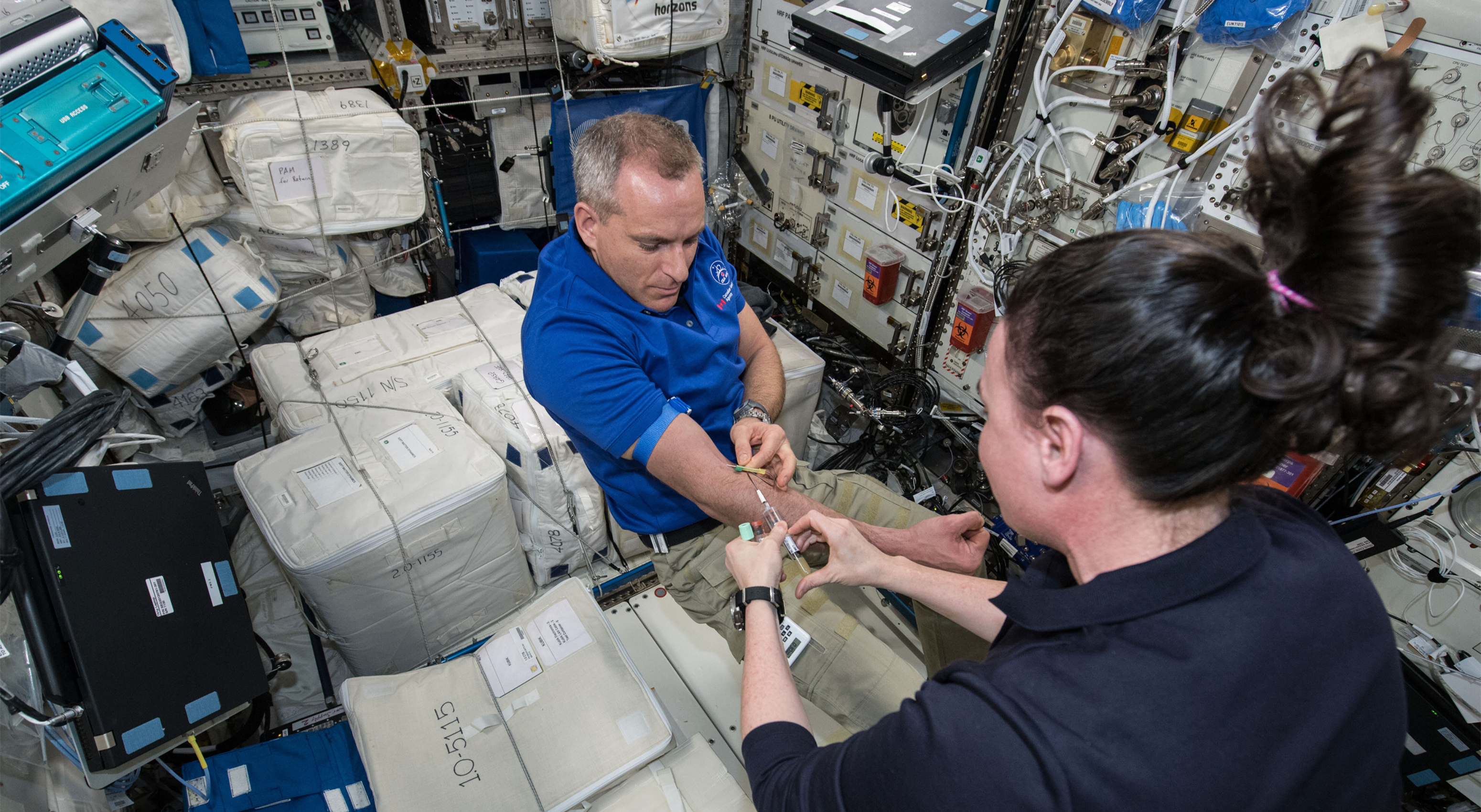 Dr. David Saint-Jacques having blood drawn aboard the International Space Station for MARROW