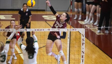 volleyball player goes for spike in game against sherbrooke