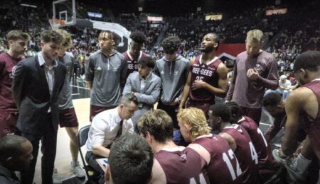 team huddle during capital hoops