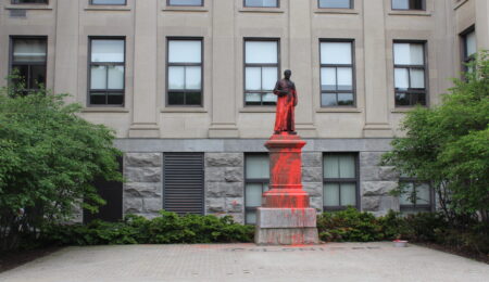 statue covered in red paint