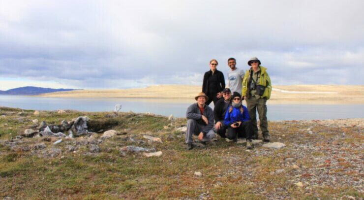 Team of scientists pose at the research site in Nunavut.