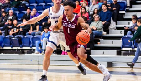 Ankit Choudhary drives past a U of T defender