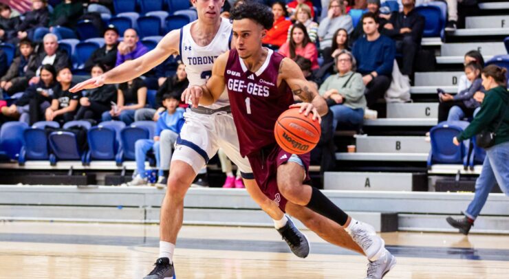 Ankit Choudhary drives past a U of T defender