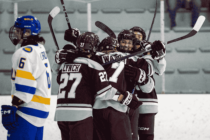 geegees hockey team celebrates