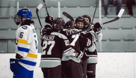 geegees hockey team celebrates