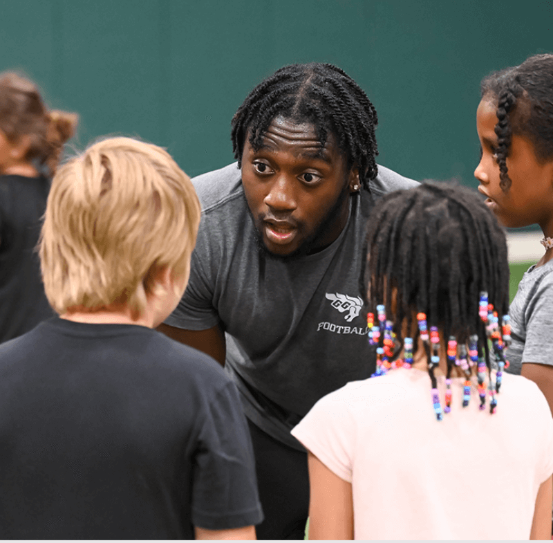 kwabena talks to children